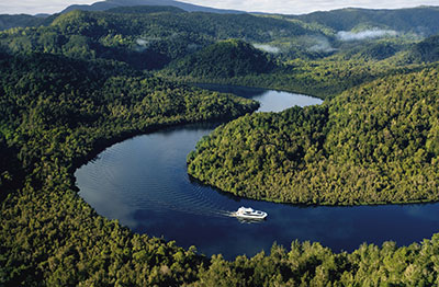 Aerial view of boat generated waves on the Gordon River.